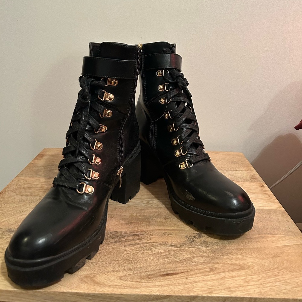 Black Leather Ankle Boots with Gold Accents